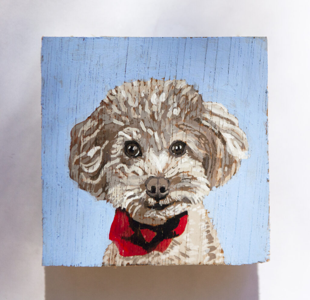 mini pet portrait shows painting of curly haired dog wearing hankercheif
